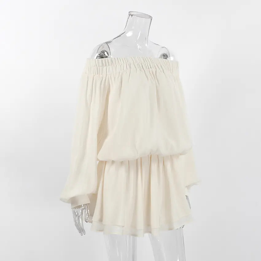 Cream off shoulder smock waist chiffon mini dress on mannequin, three quarter view