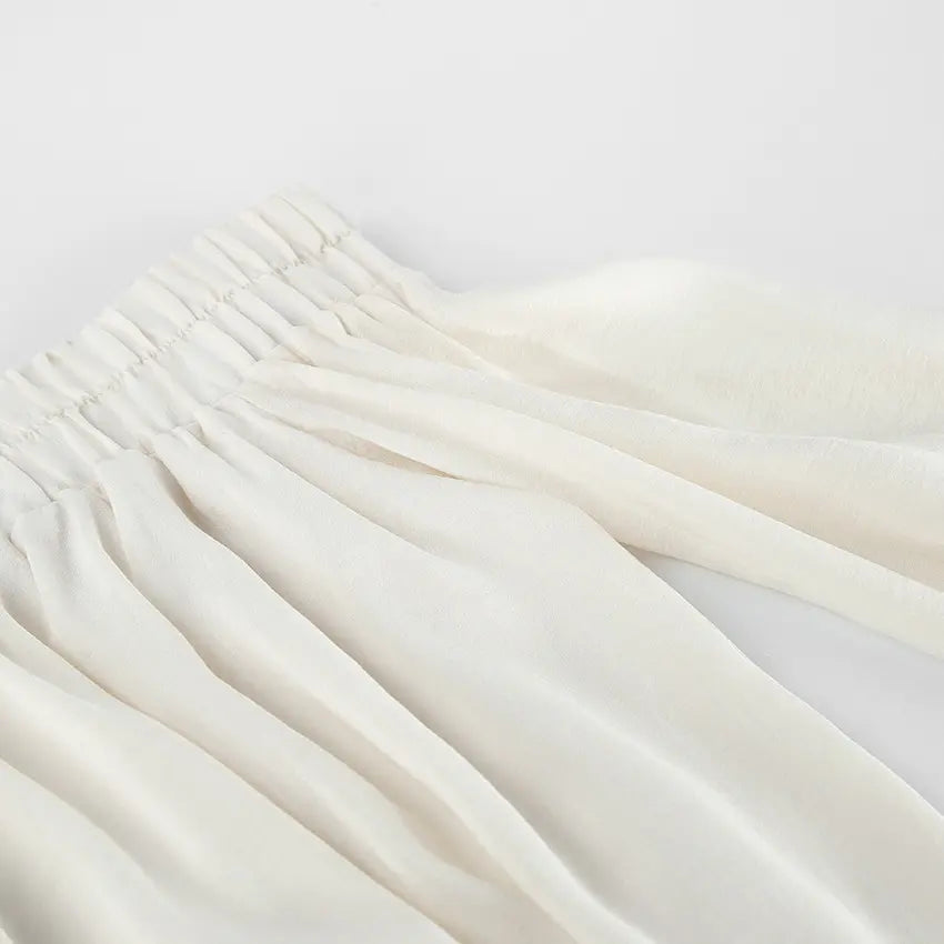 Close-up of elastic smocked waist