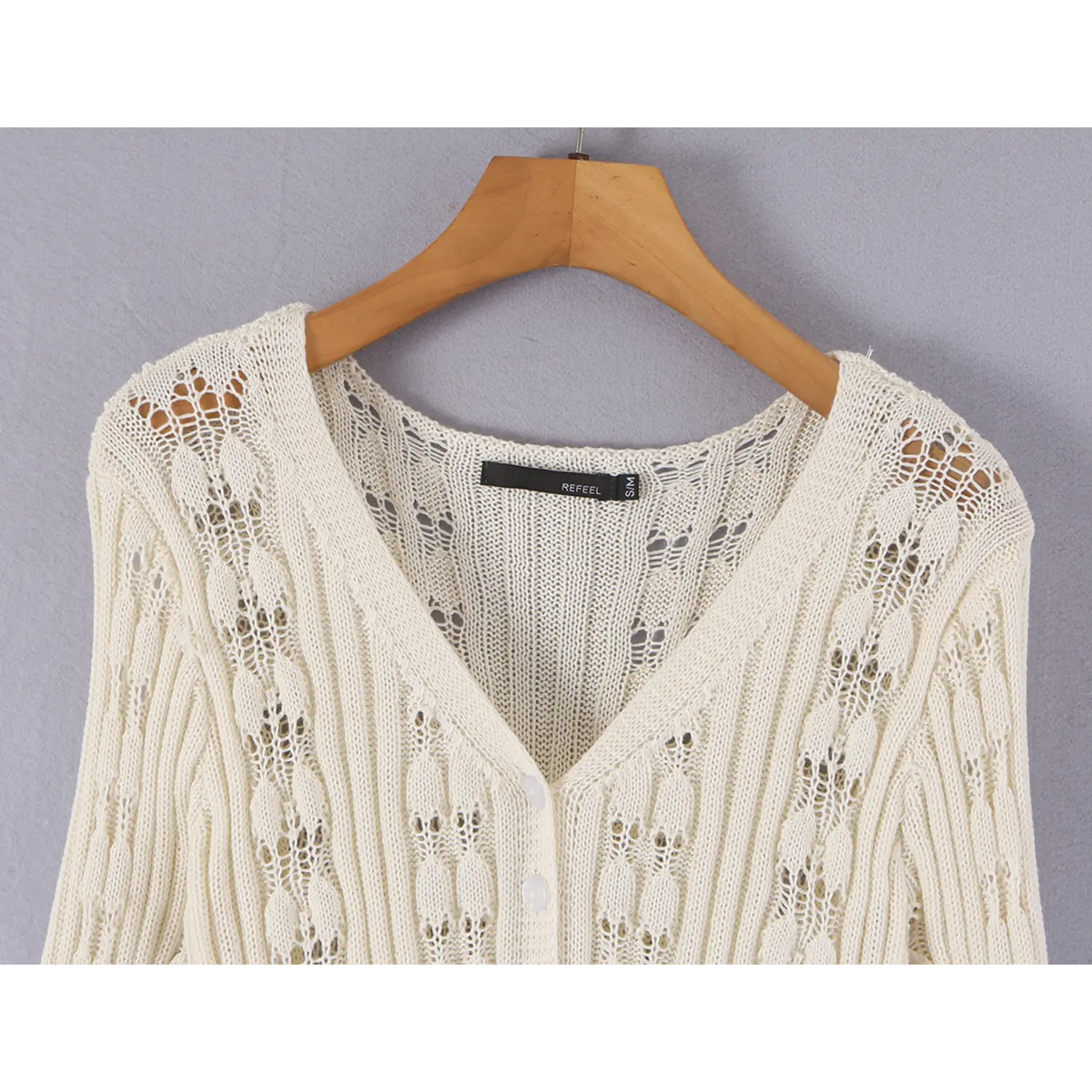 Close-up of V-neck and inner label