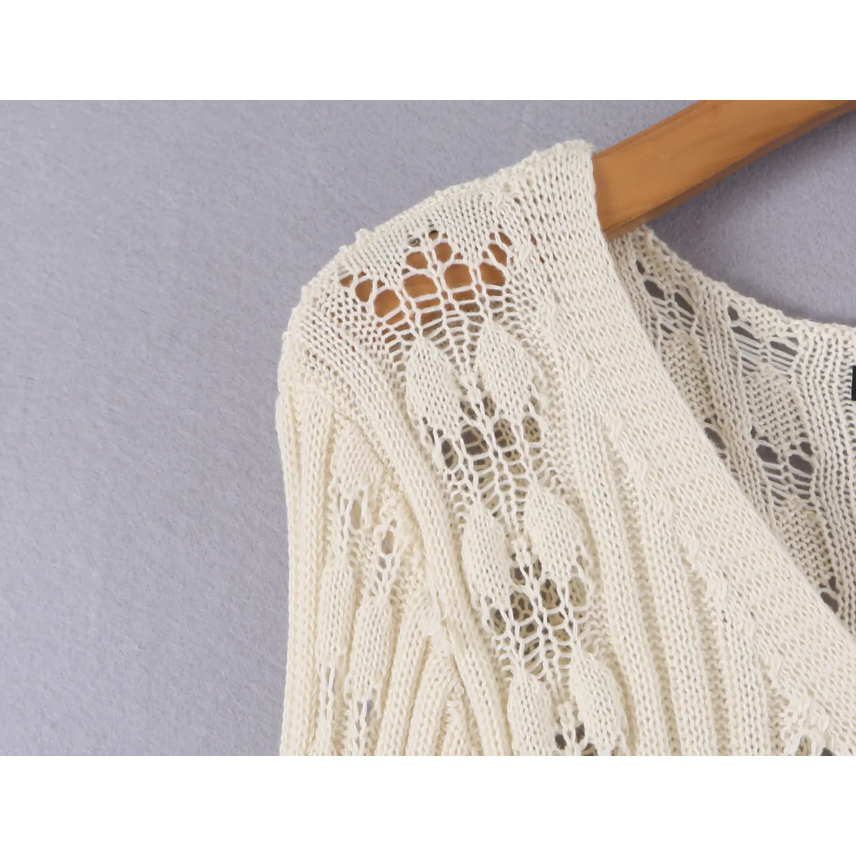 Close-up of shoulder pointelle knit detail
