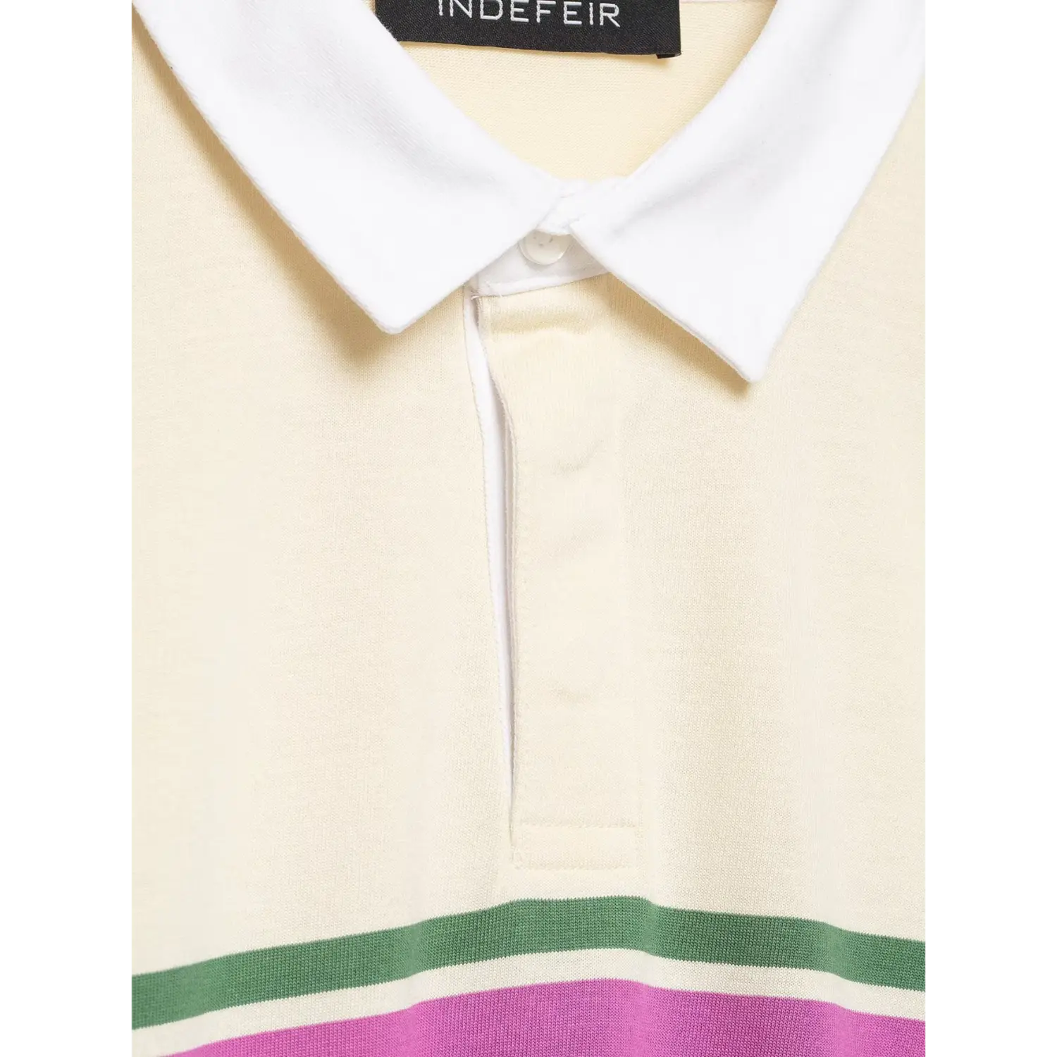 Extreme close‑up collar placket and button detail cream striped long sleeve rugby polo top