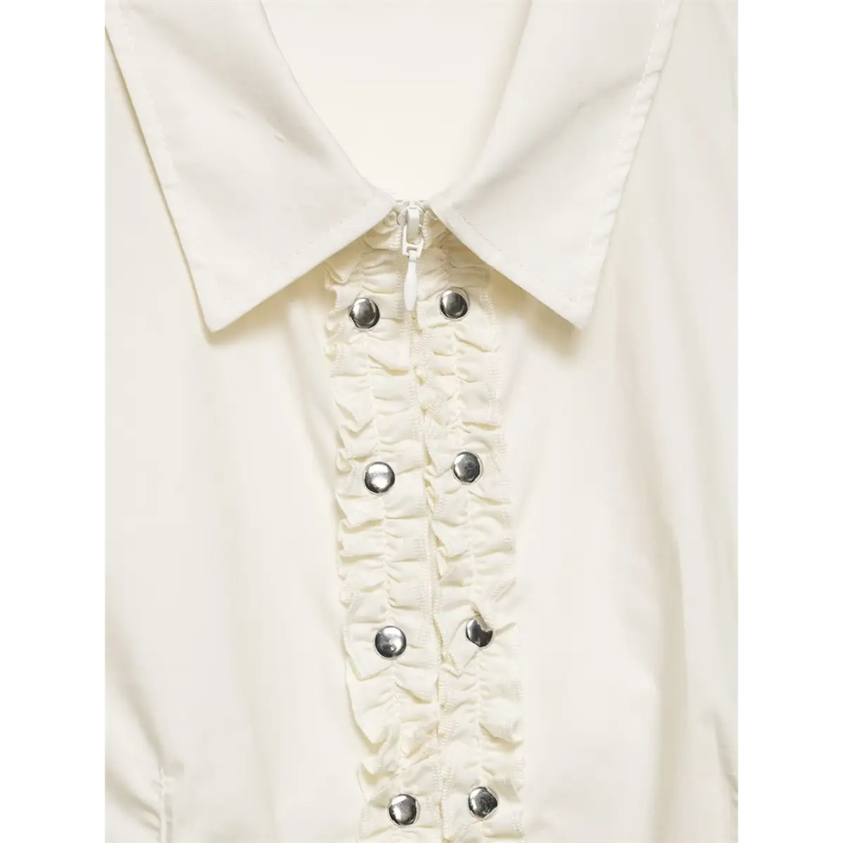Close-up of the shirt collar, showing the pointed design and ruffled placket at the neckline
