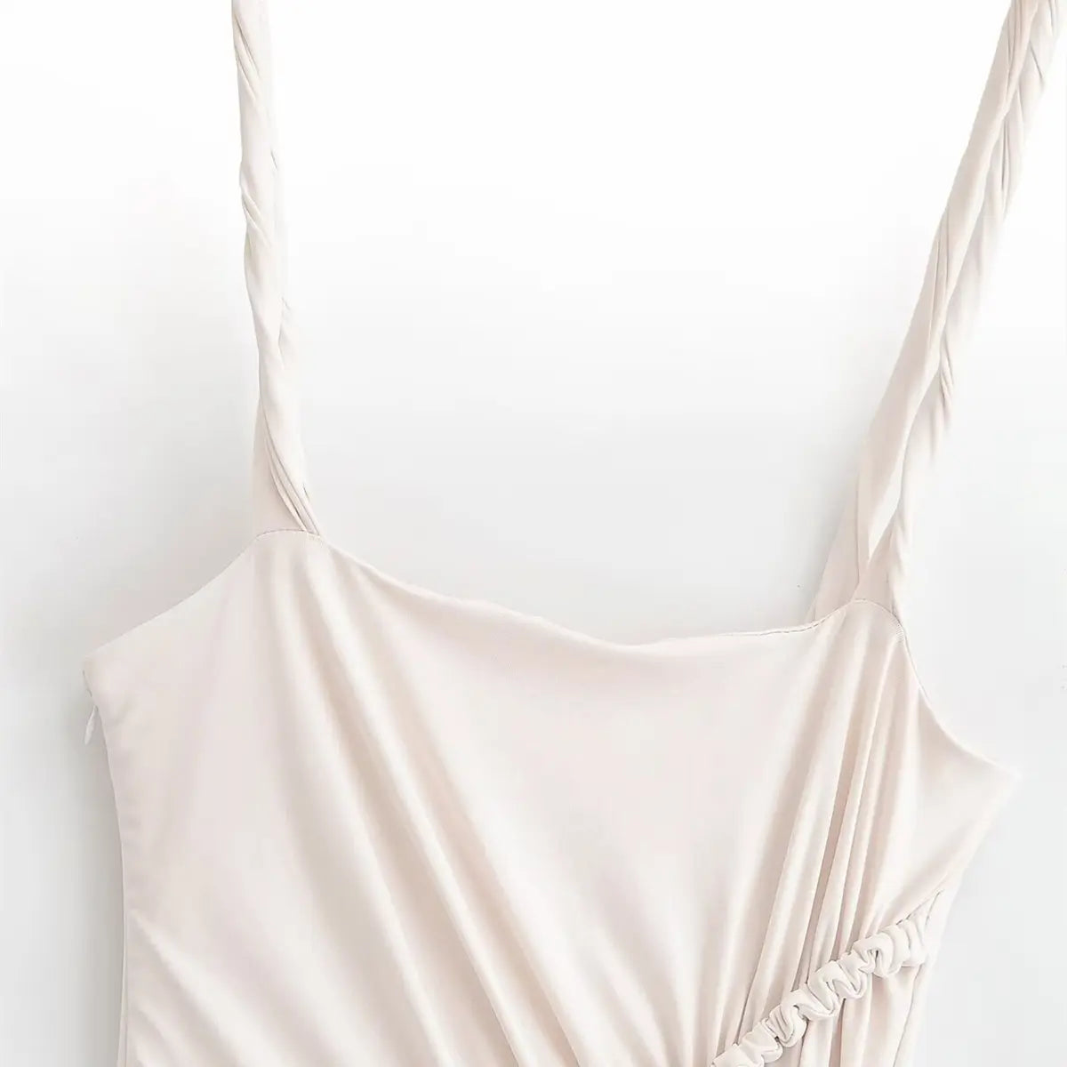  Front view of the cream maxi dress, showing the twisted spaghetti straps and square neckline