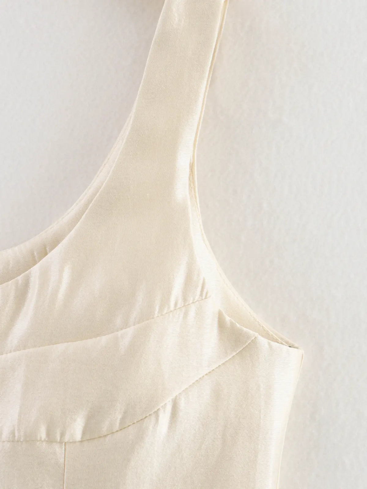 Close-up of wide strap and bust seam