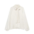 Cream tie neck bow blouse, front flat lay