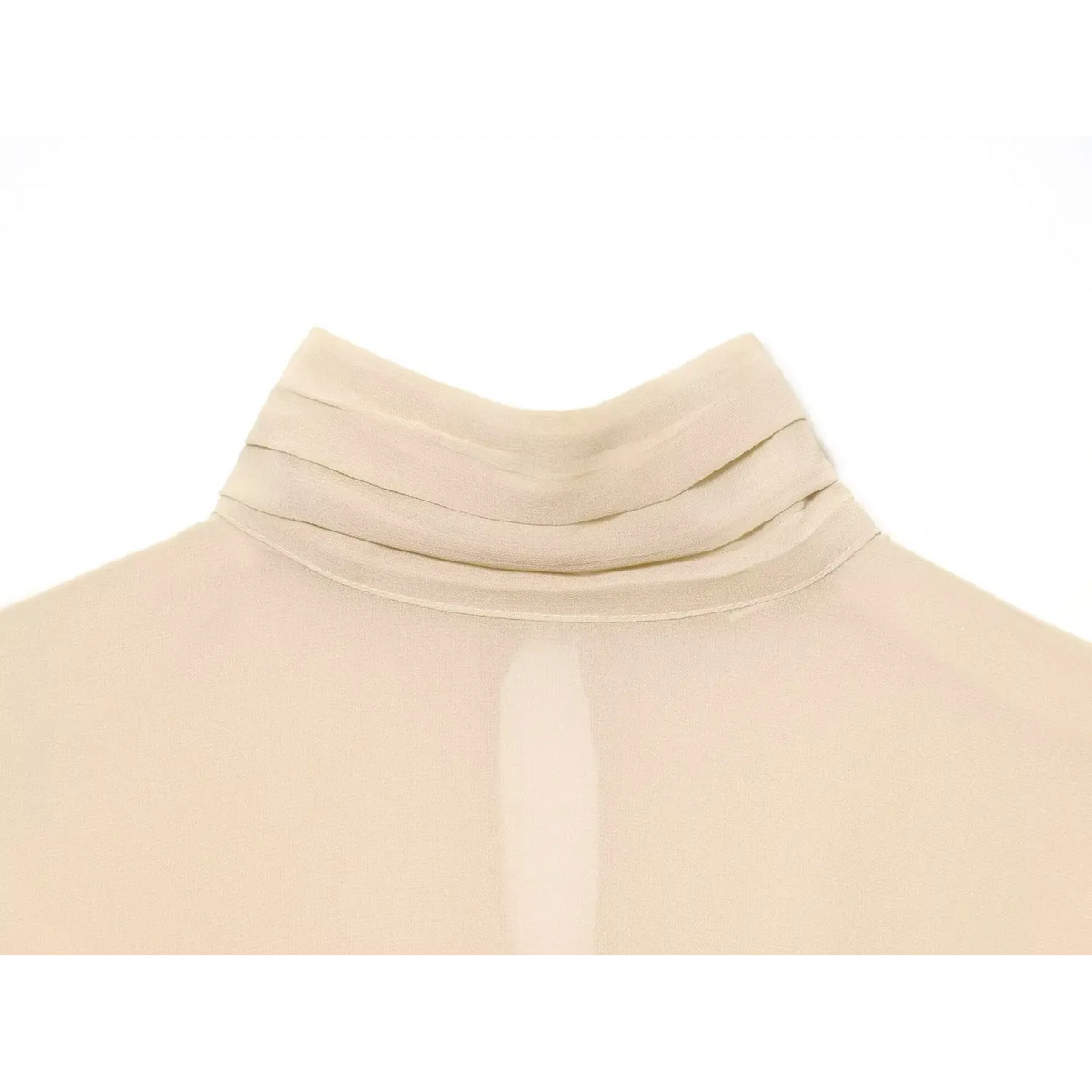 Close-up of draped turtleneck collar