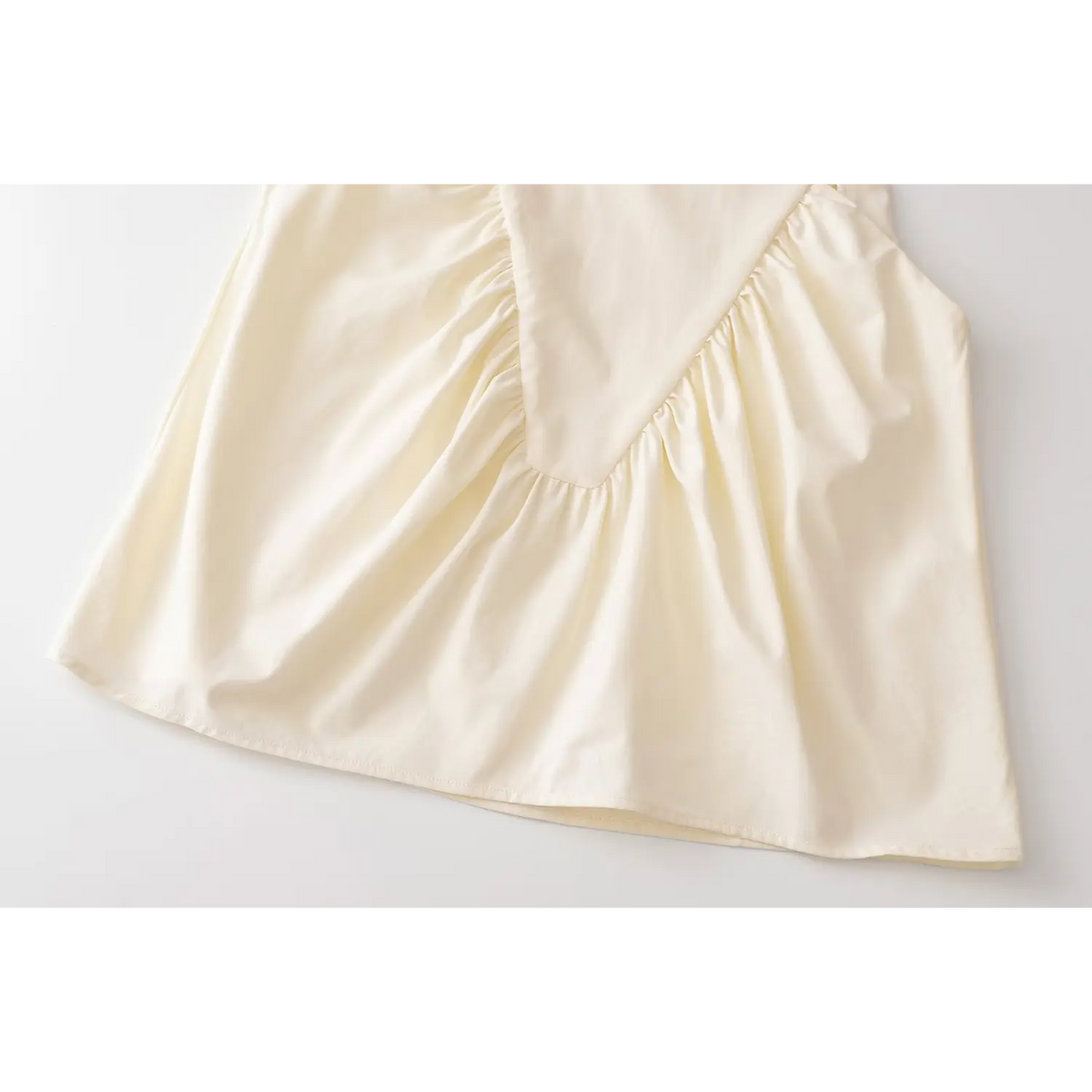 Close-up of v shape ruched seam detail