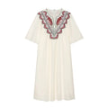 Front view cream white midi dress with paisley embroidery, V-neck, batwing sleeves, relaxed flowy fit