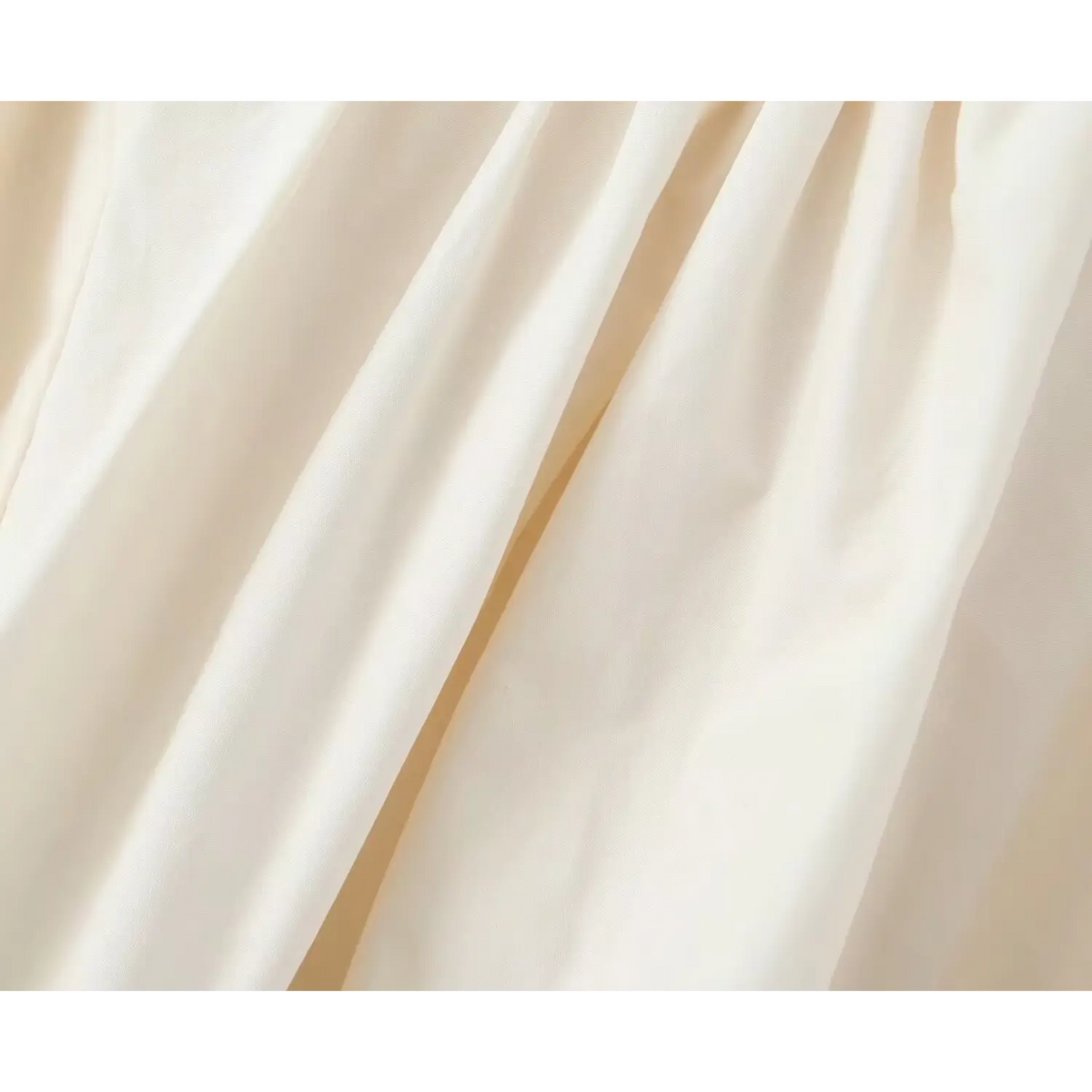 Macro close‑up of smooth soft cotton fabric texture and natural drape