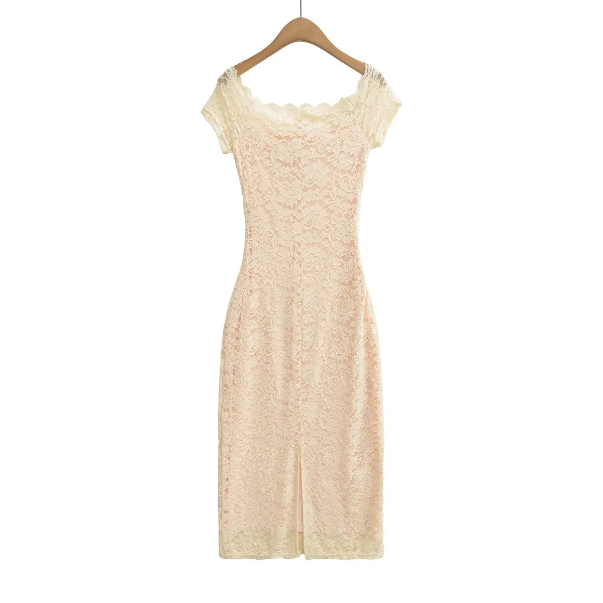 Cream ruched lace maxi dress hanging on wooden hanger