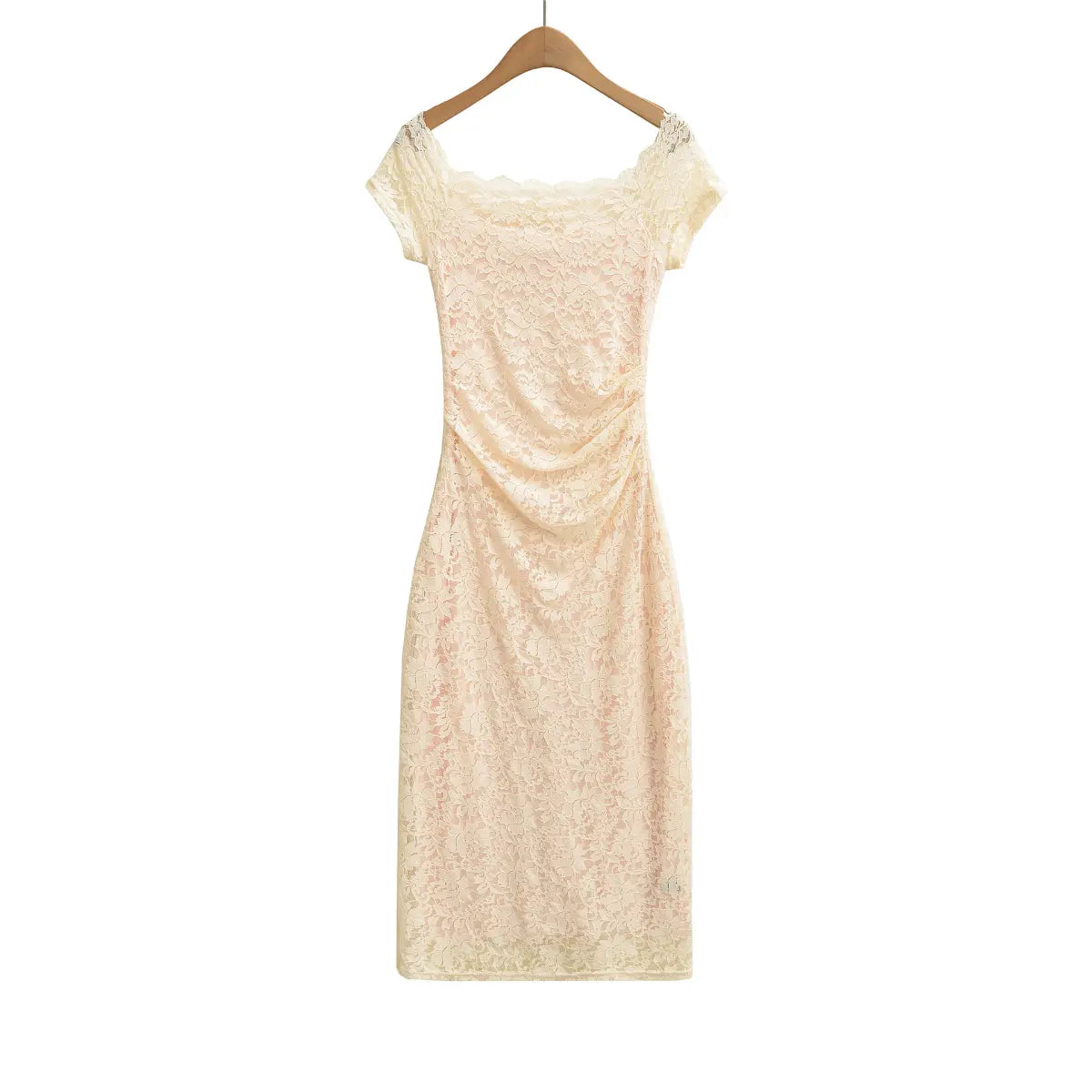 Cream off‑shoulder lace maxi dress on wooden hanger