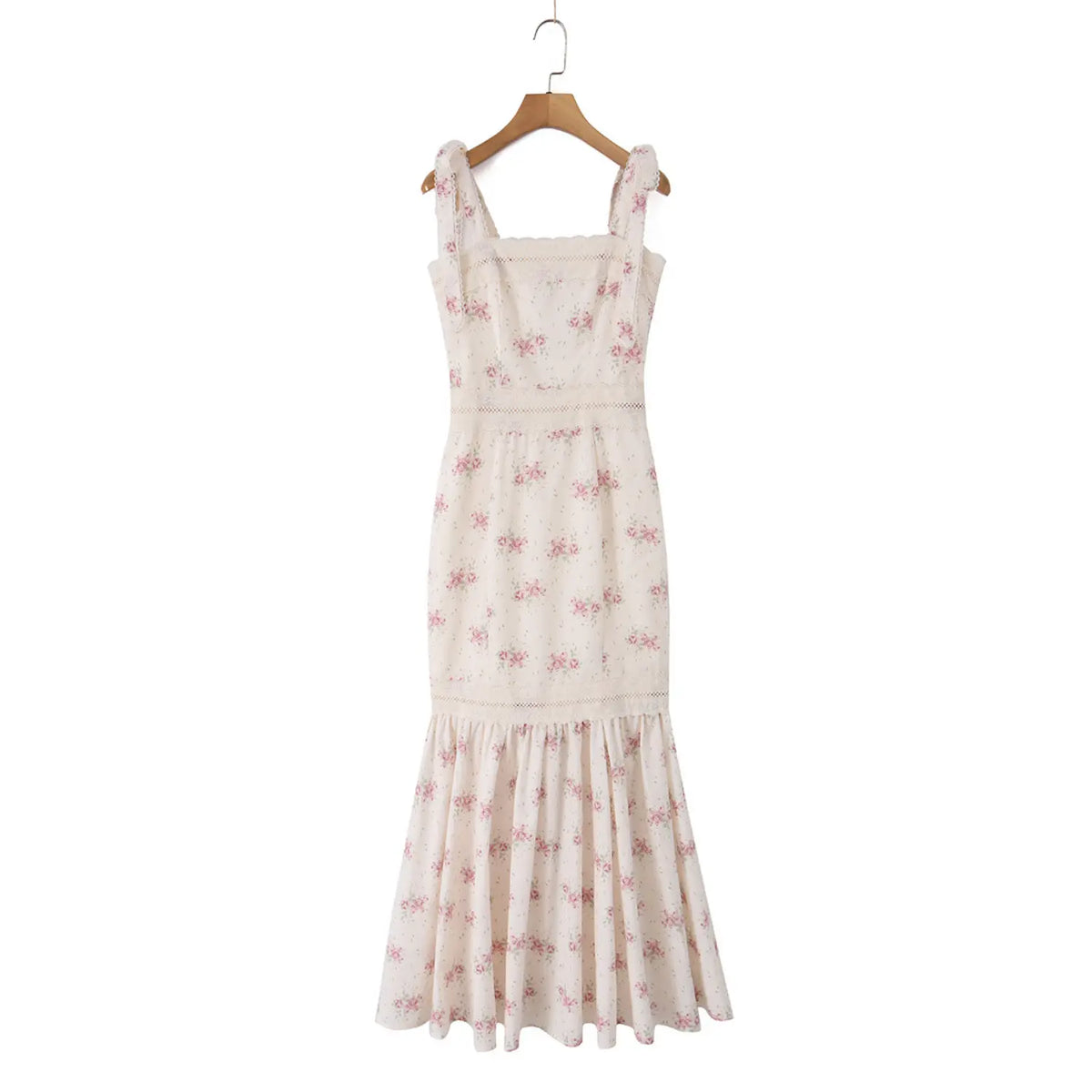 Cream pink floral mermaid maxi dress hanging on wooden hanger, front view