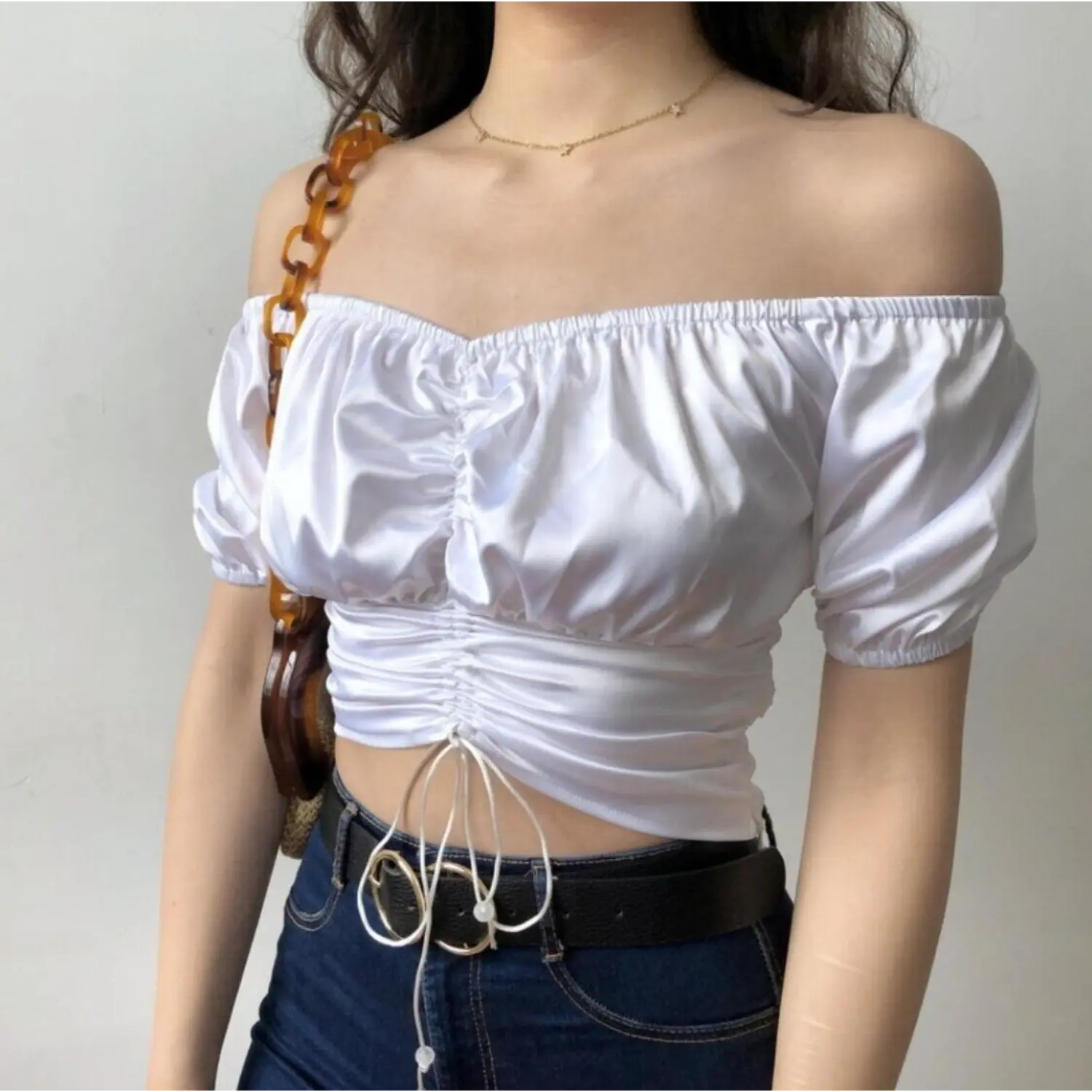 Partial model photo white silky off shoulder puff sleeve ruched front cropped top