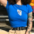 Cropped outdoor model photo blue slim fit crop tee with cartoon cat rainbow planet print