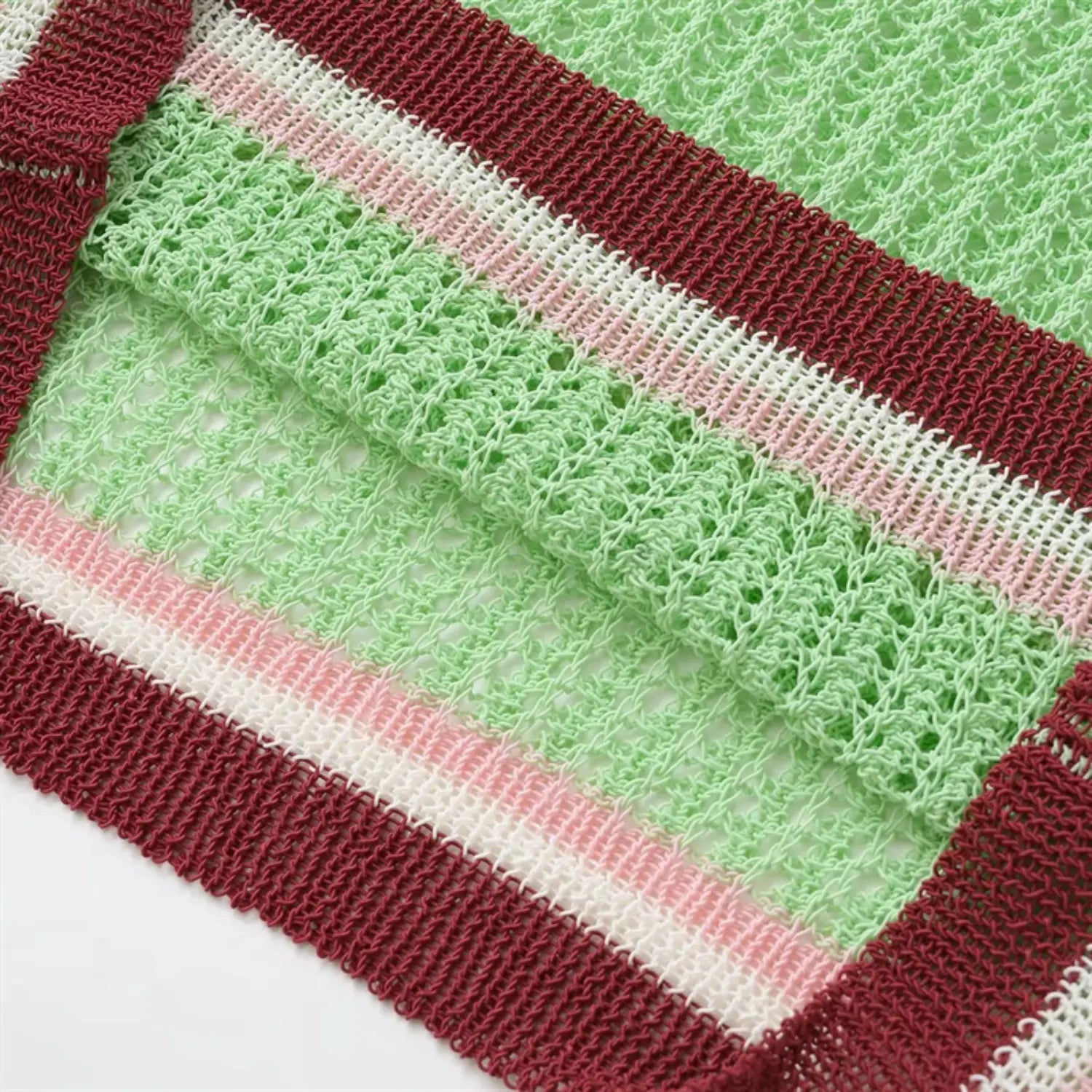 Cuff and hem detail view, double-layer ribbed knitting, color stripe alignment, clean edge stitching
