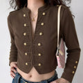 Woman wearing dark brown corduroy cropped military jacket casual vintage outfit
