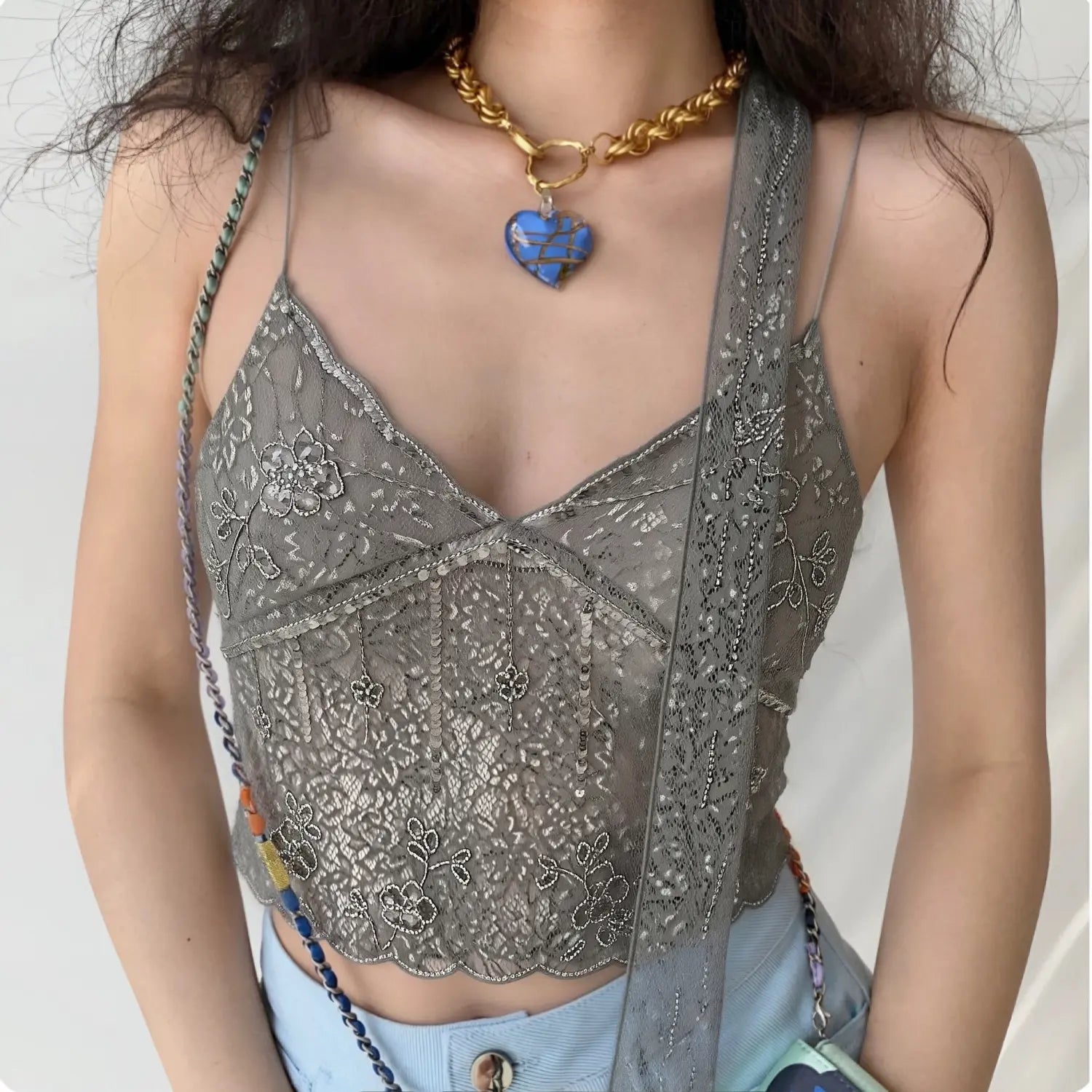 Model front wearing shot dark grey beaded lace cami top with decorative long lace neck tie sash