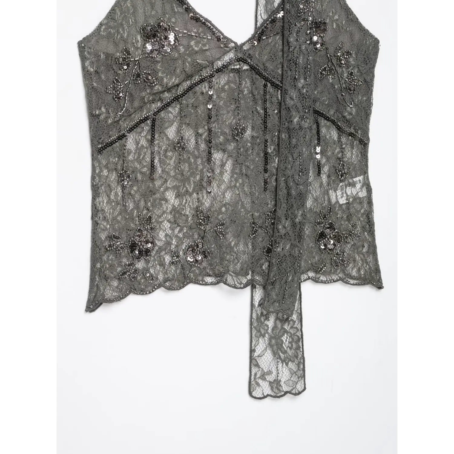 Flat lay torso full view dark grey lace cami displaying vertical sequin lines and all‑over floral beaded pattern