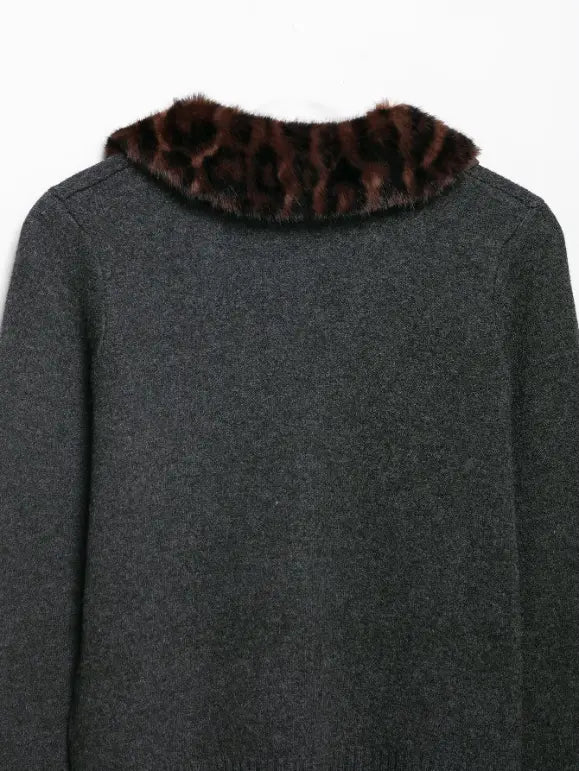 Close-up of back leopard fur collar