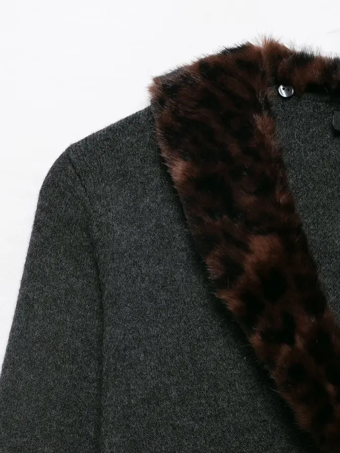 Close-up of leopard print fur collar and shoulder
