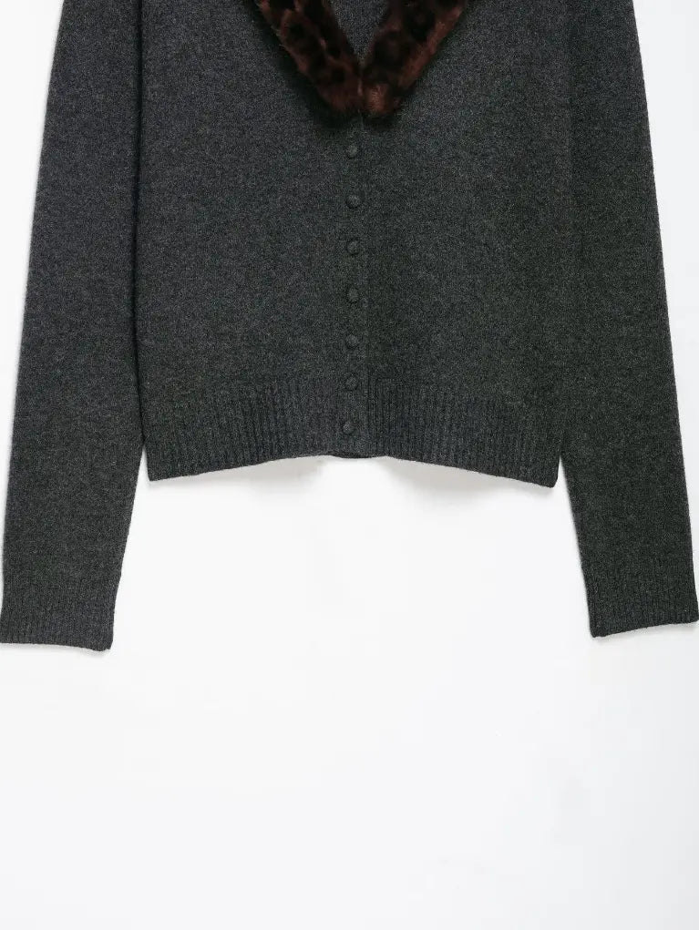Close-up of ribbed hem and button placket