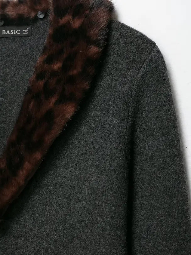Close-up of shoulder seam and fur collar