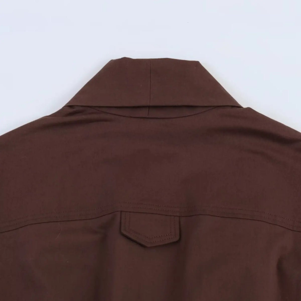 Close‑up of back collar and yoke seam detail
