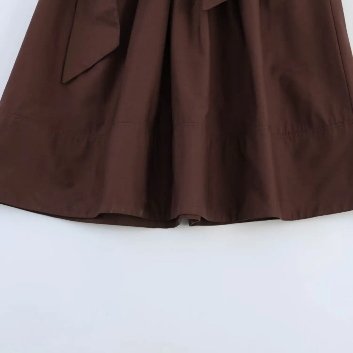 Partial view of flowy pleated maxi skirt
