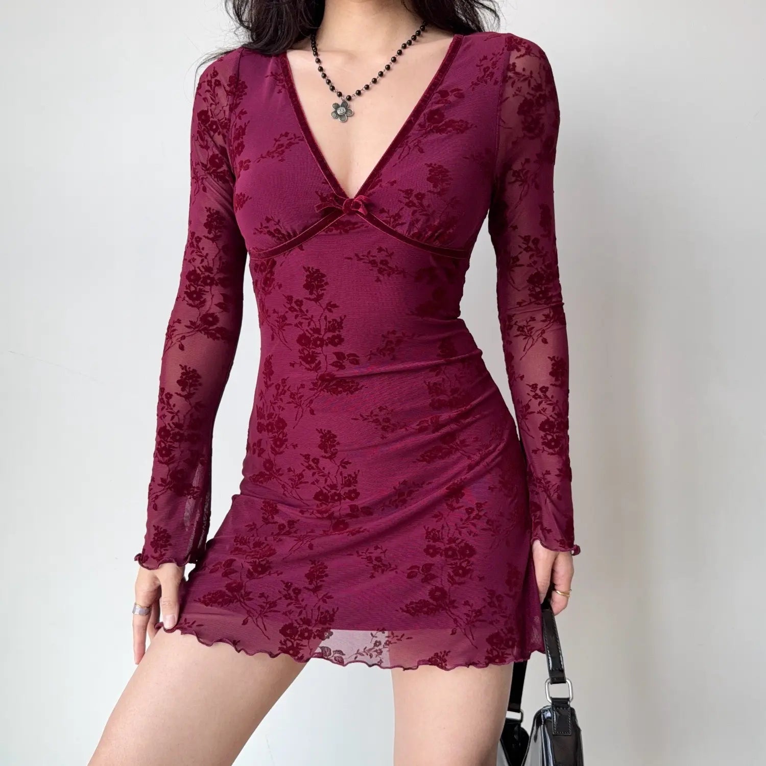 Deep burgundy velvet flock floral sheer mesh mini dress, velvet trim v neck bow, ruffle hem and flared cuff long sleeve tight party dress
