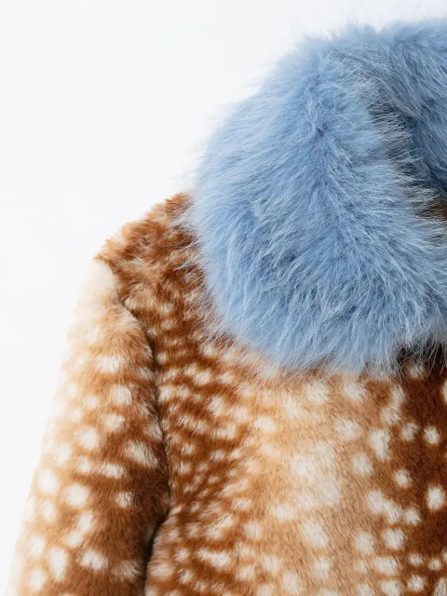 Close-up of light blue fur collar and deer spot print