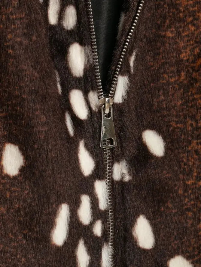 Macro close-up of metal zipper pull