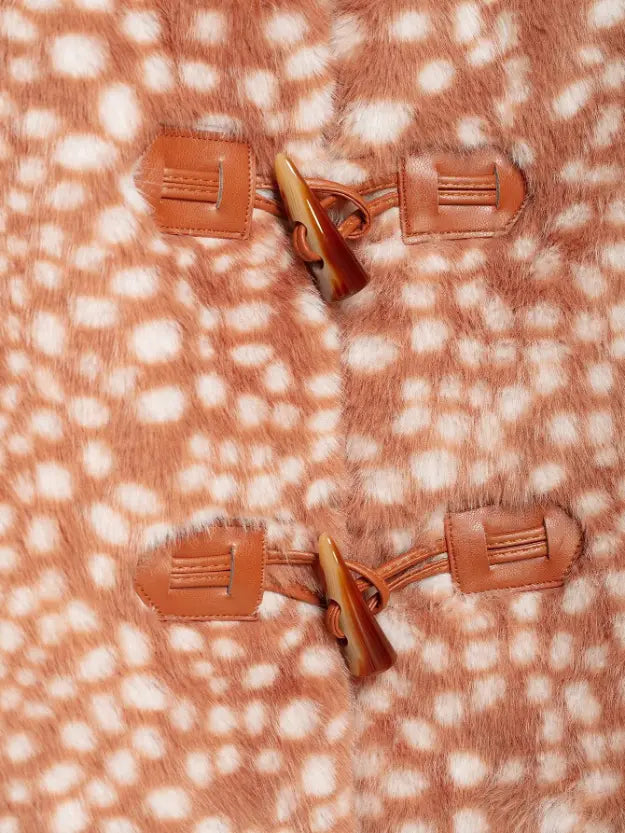 Close-up of horn toggle and leather tabs