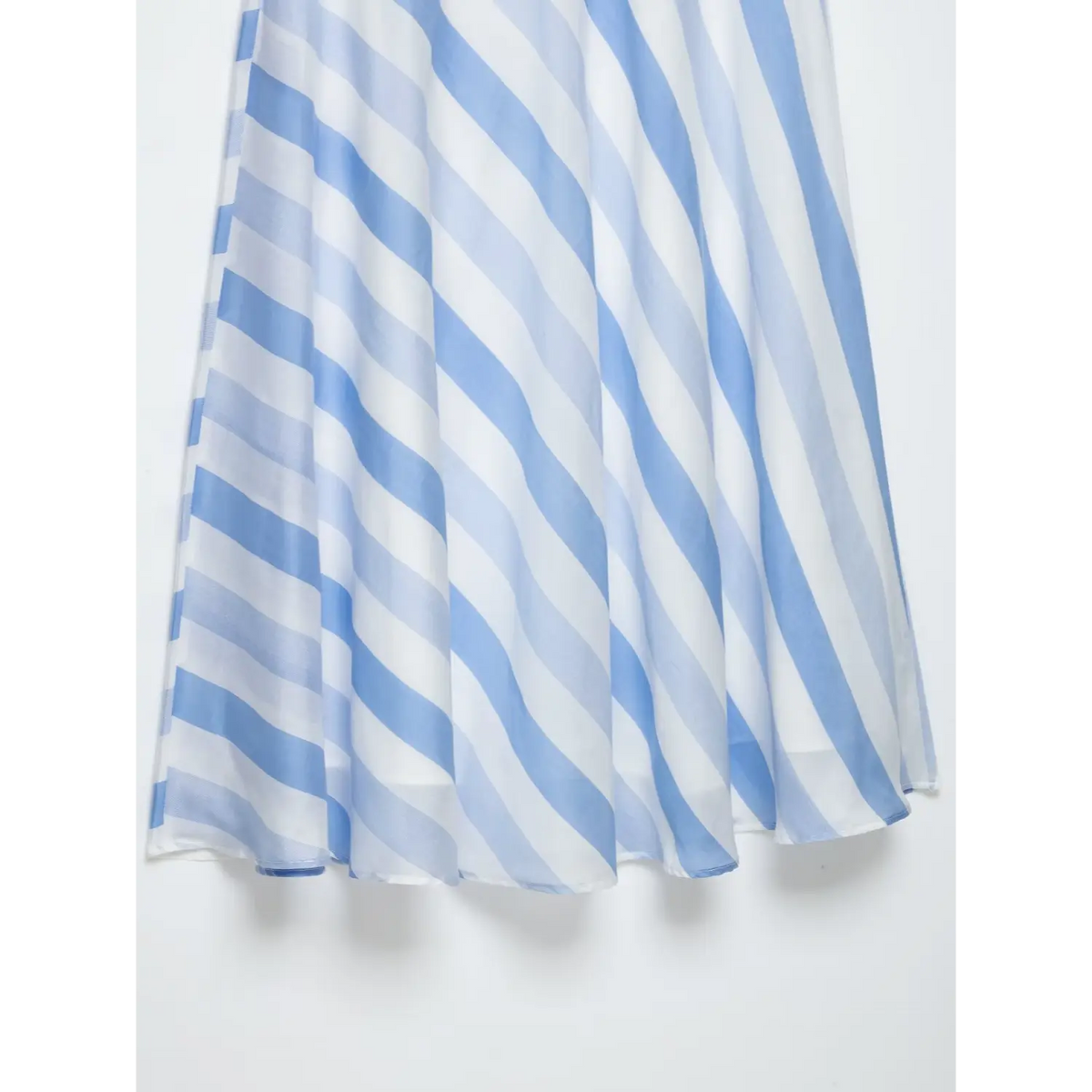 Close-up of layered skirt hem drape
