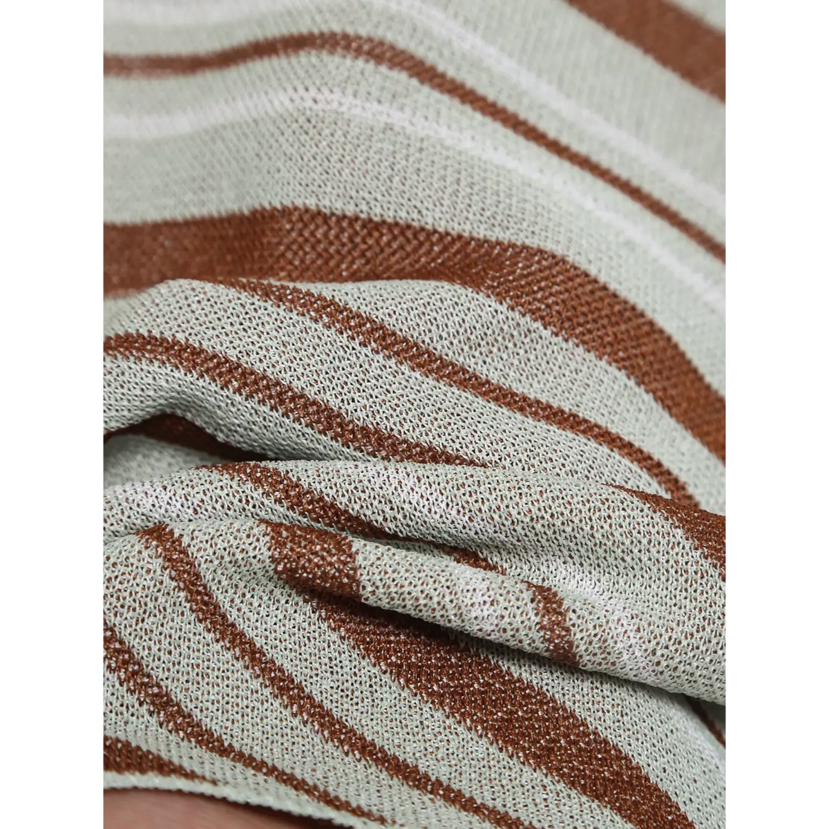 Close-up of diagonal stripe knit fabric texture