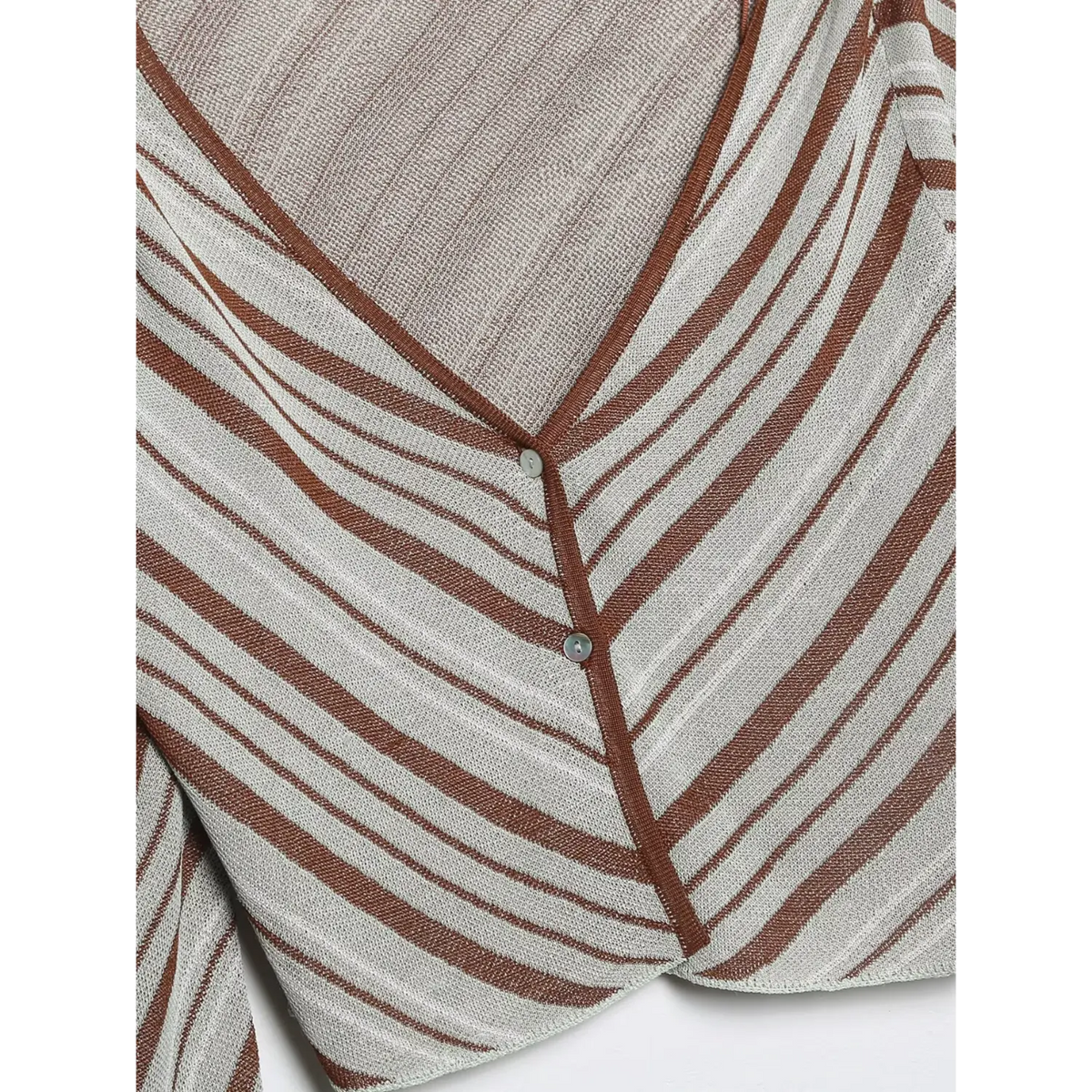 Close-up of V neckline and button front