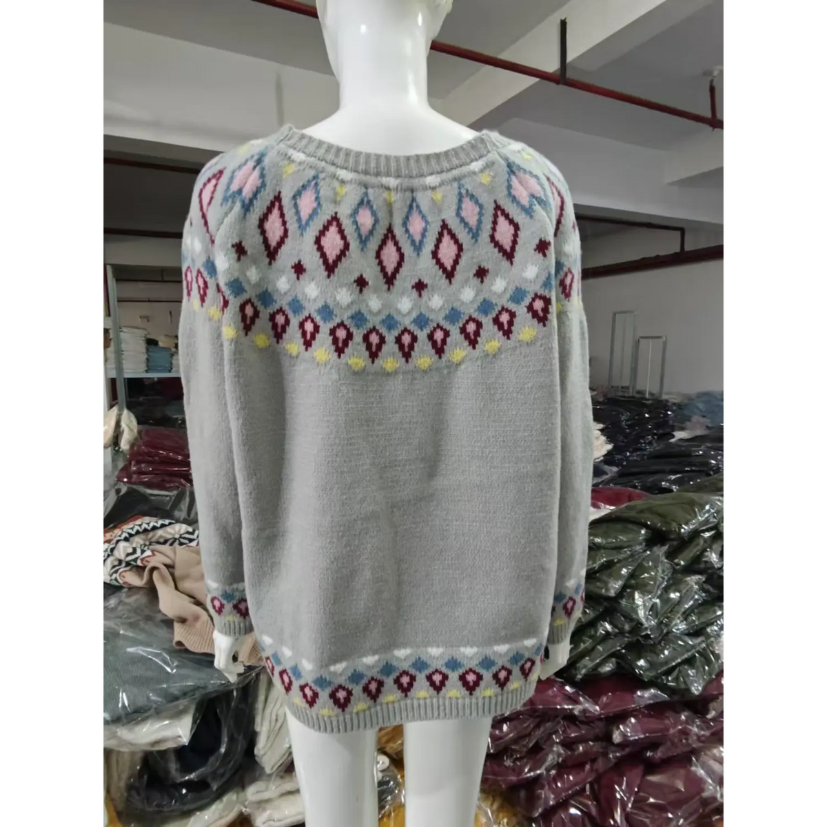 Back view of diamond fair isle yoke knit sweater on mannequin