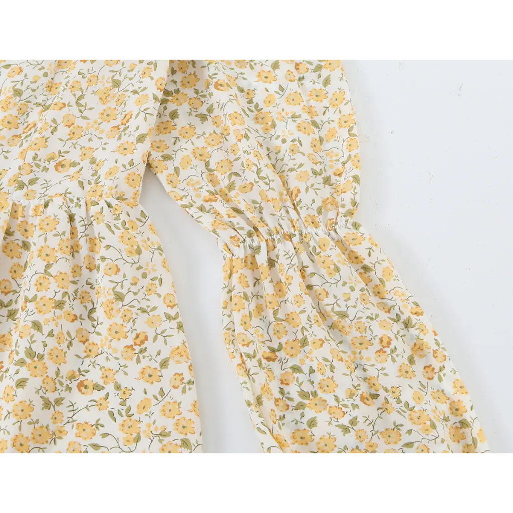 Close-up of gathered forearm sleeve detail
