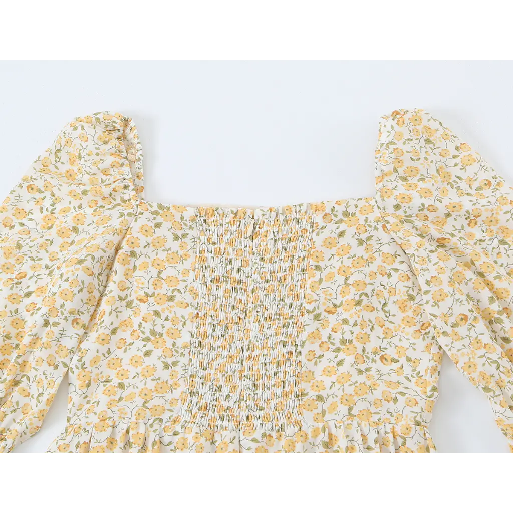 Close-up of smocked back and square neckline