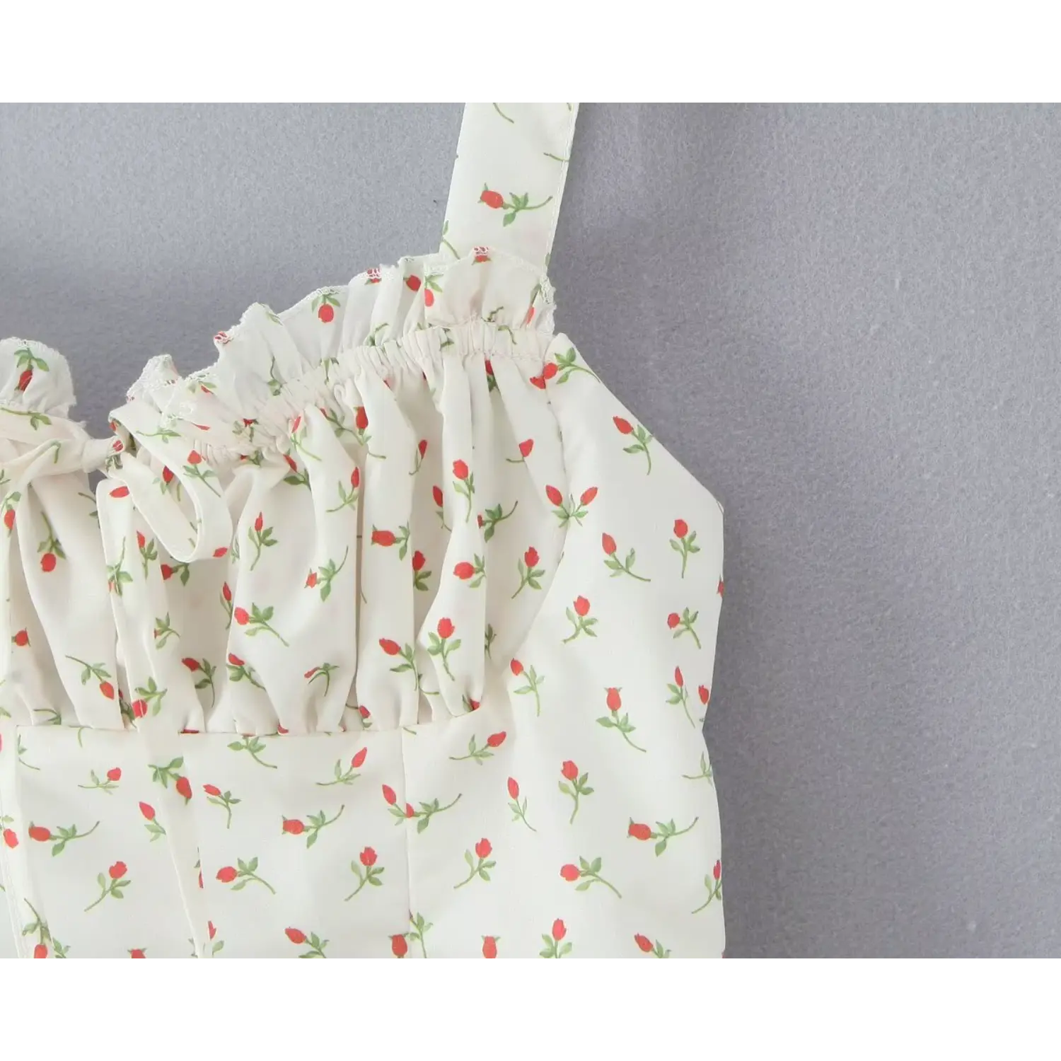 Partial shot gathered bust construction lightweight woven fabric tiny red rose floral print