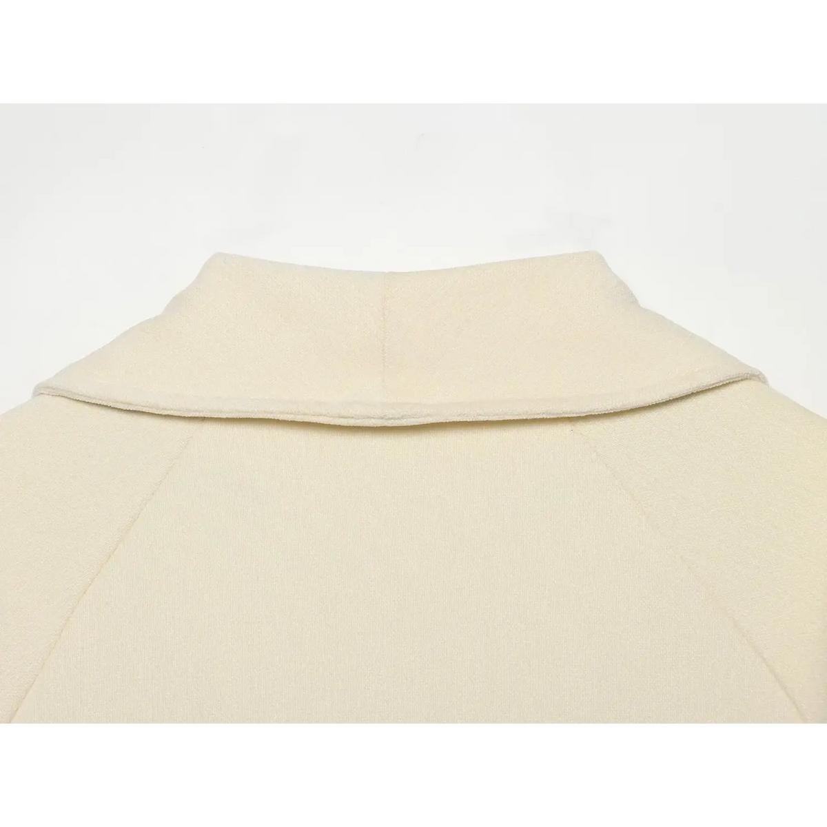 Close-up of cream back collar