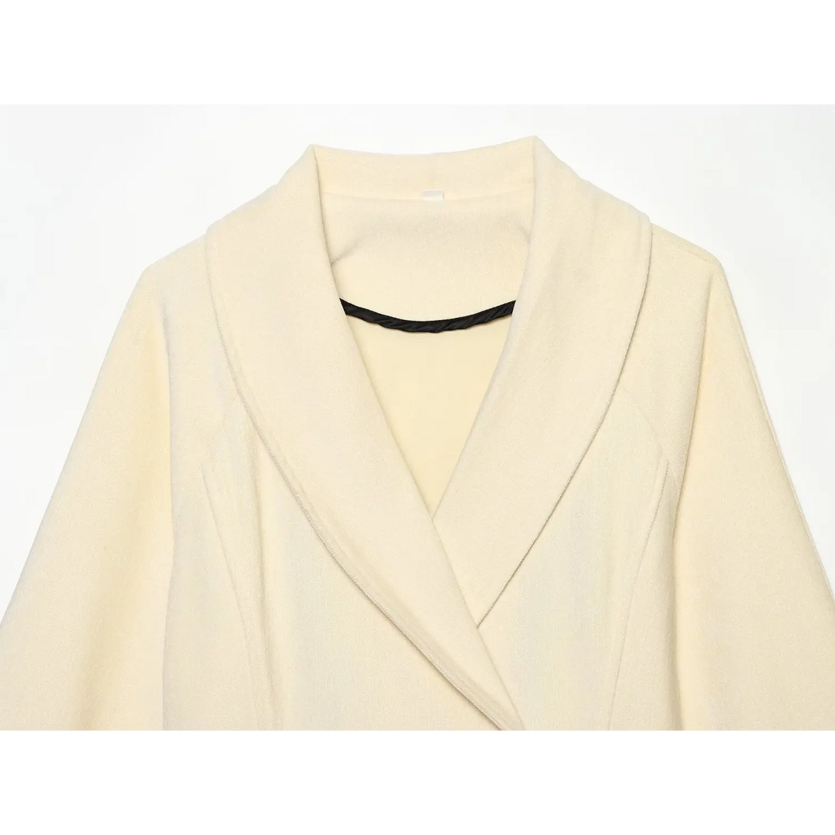 Close-up of cream shawl collar neckline