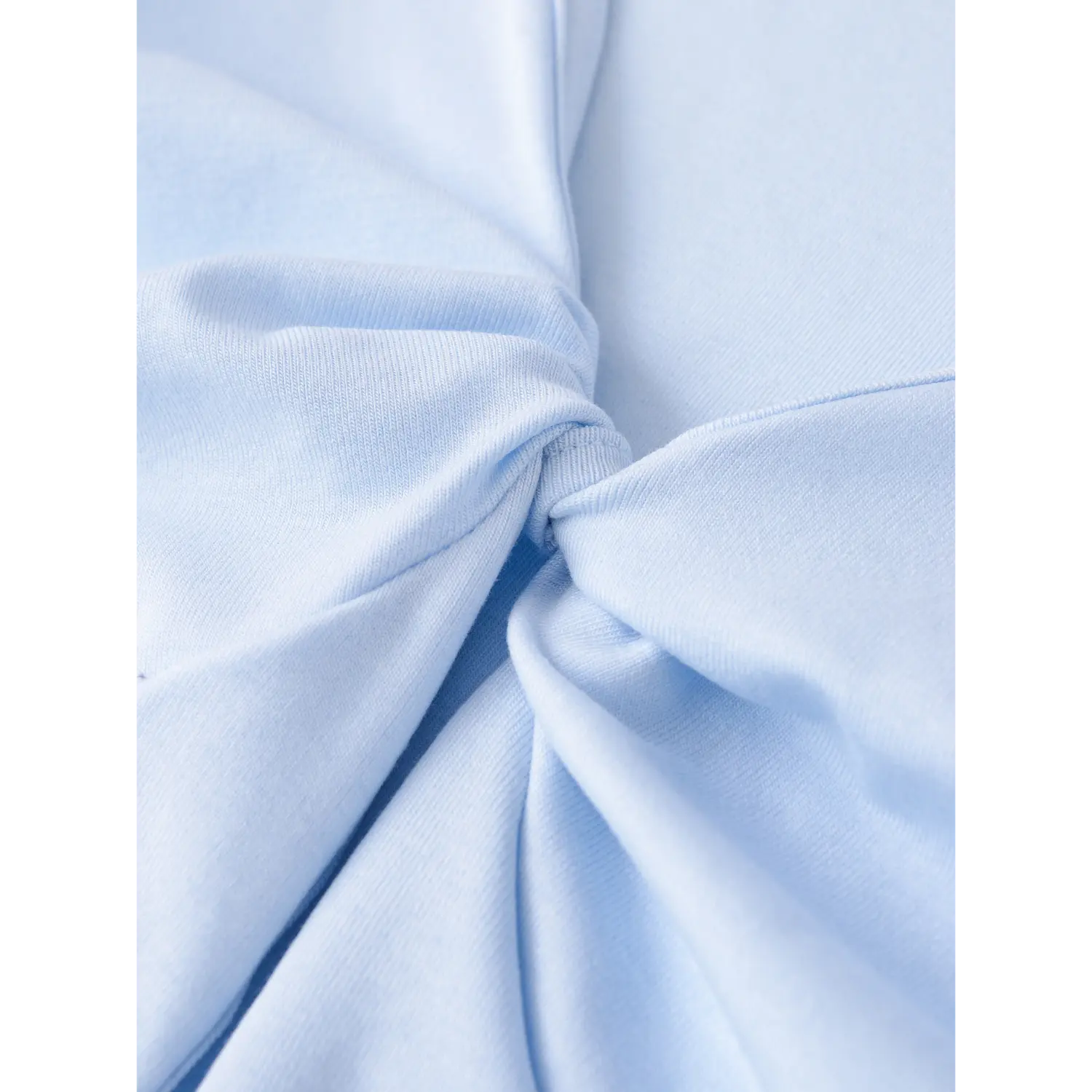 Double twist knot tank bust macro flat shot, knit twist fixed stitching high stretch breathable fabric texture double layer splicing craft white background detail
