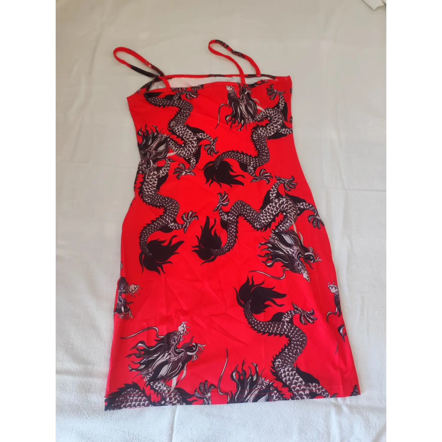 Flat lay front view, red chinese dragon print spaghetti strap bodycon mini dress
