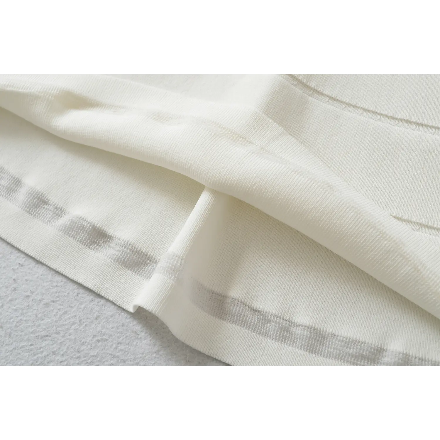 Dress folded double lining macro close-up, outer sheer knit solid anti-see-through inner lining smooth drape anti-chafing craft shot