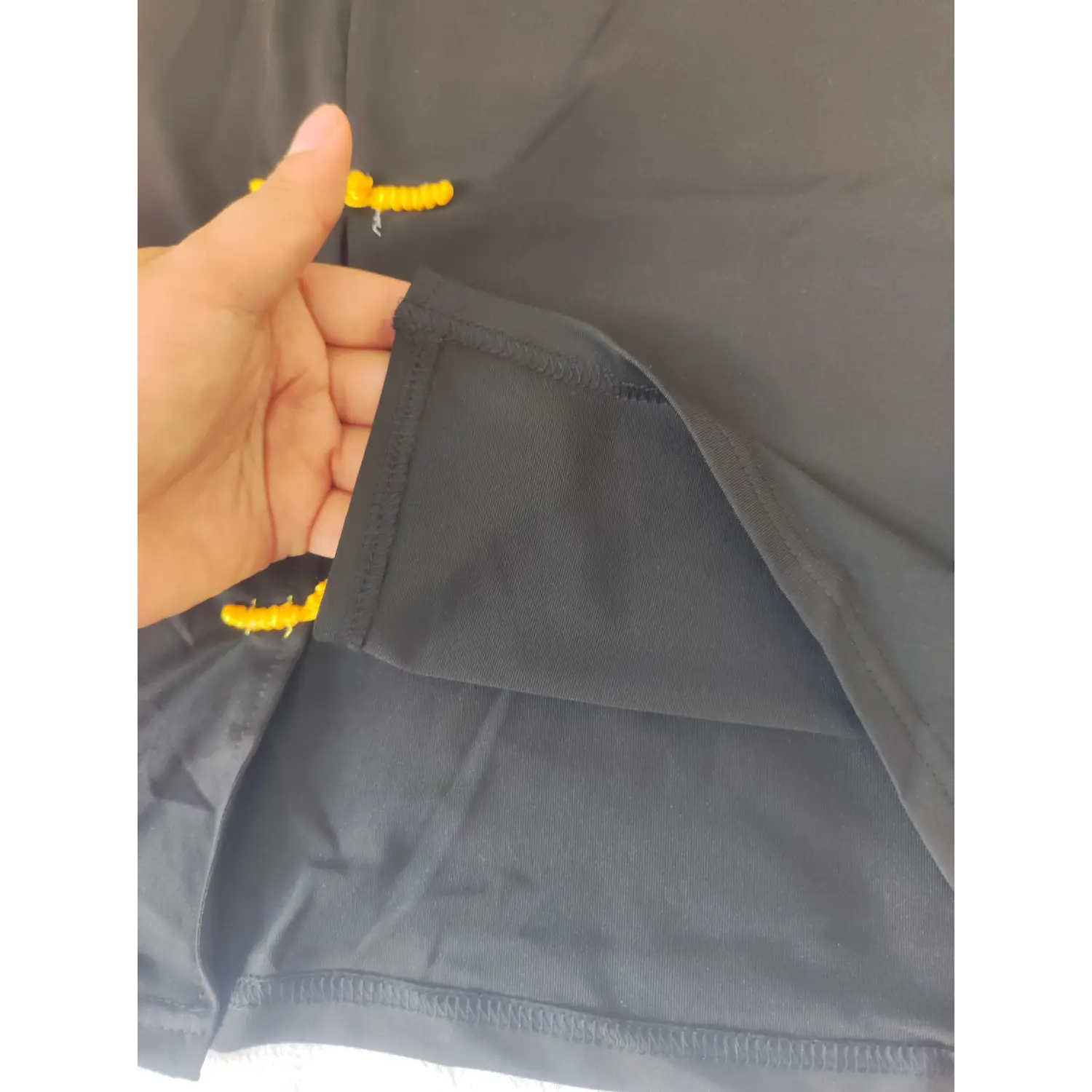 Built-in inner lining view on side slit, black bodycon strapless mini dress | Detail