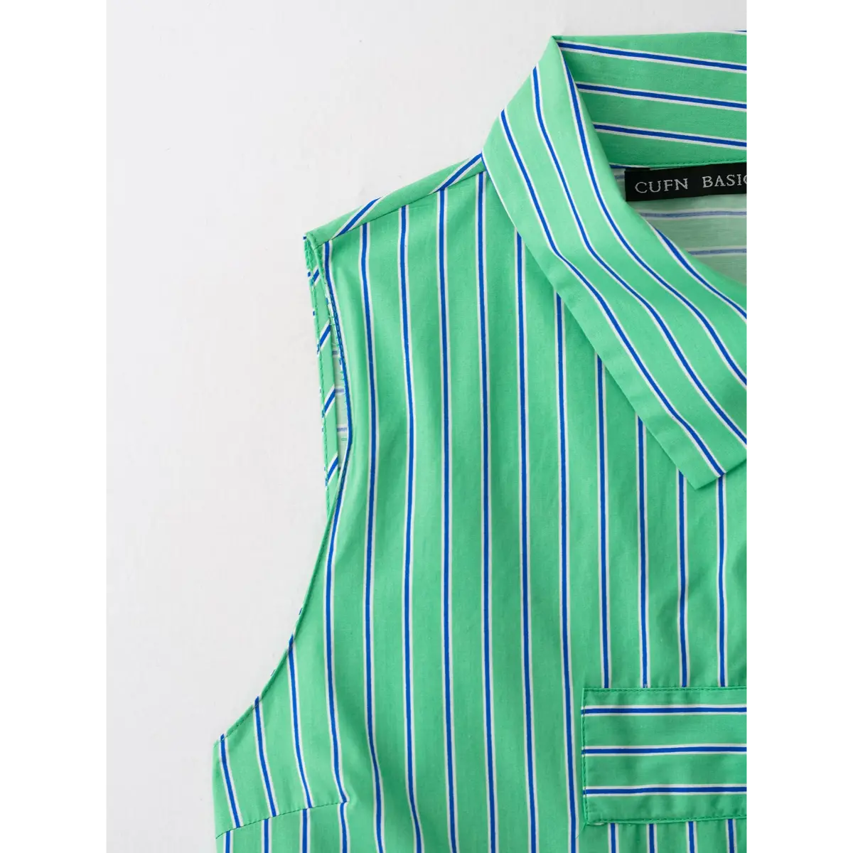 Double patch chest pocket detail matching striped woven fabric