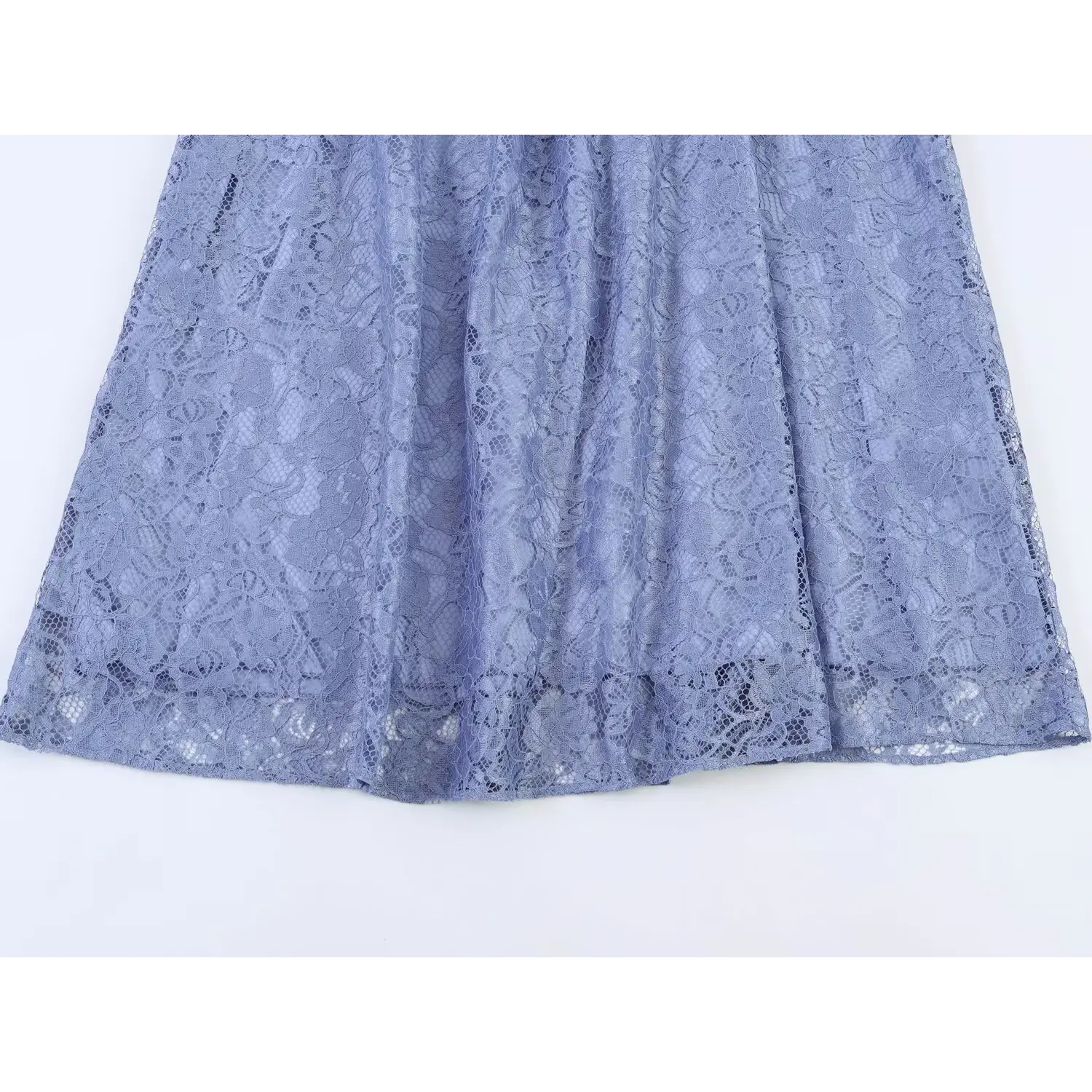 Flat lay close‑up full skirt and hem detail dusty blue floral lace maxi dress