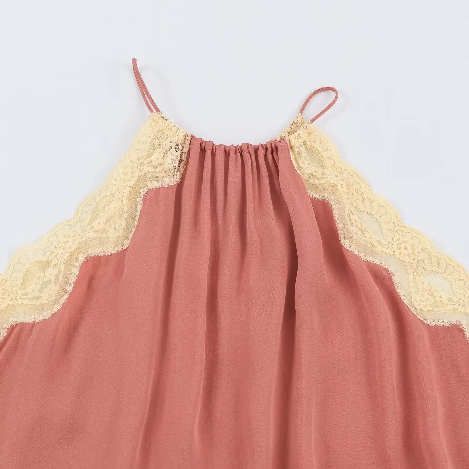 Flat closeup of dusty pink halter cami, elastic gathered halter neck, cream scallop lace trim on shoulder cutout