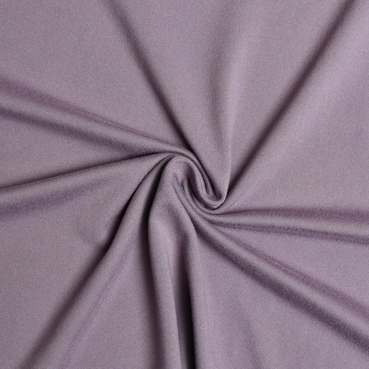 Texture shot of soft stretch dusty purple jersey fabric