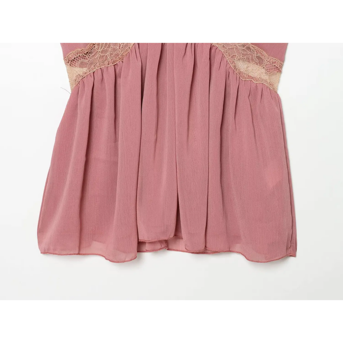 Close-up of gathered babydoll hem